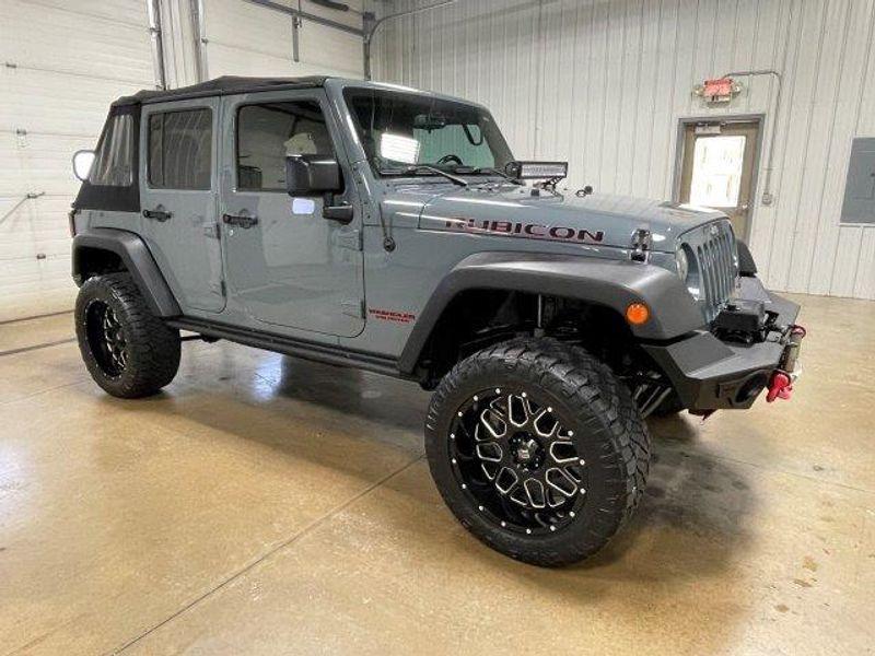 used 2014 Jeep Wrangler Unlimited car, priced at $16,891