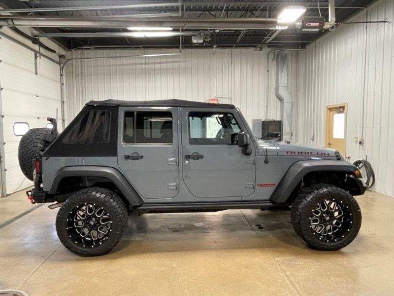 used 2014 Jeep Wrangler Unlimited car, priced at $16,891