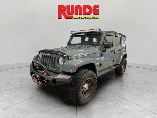 used 2014 Jeep Wrangler Unlimited car, priced at $21,572