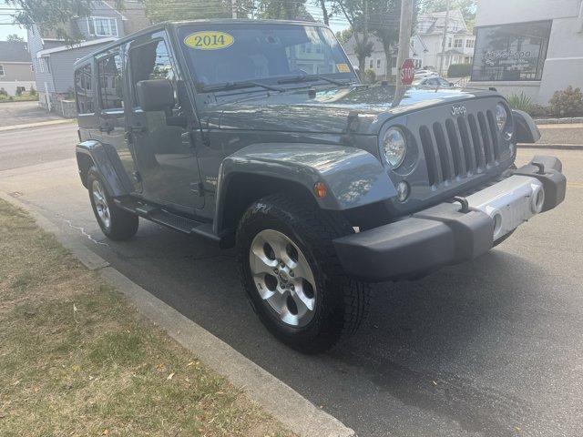 used 2014 Jeep Wrangler Unlimited car, priced at $19,231