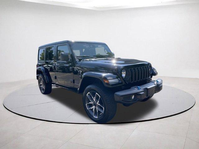 used 2024 Jeep Wrangler 4xe car, priced at $36,130