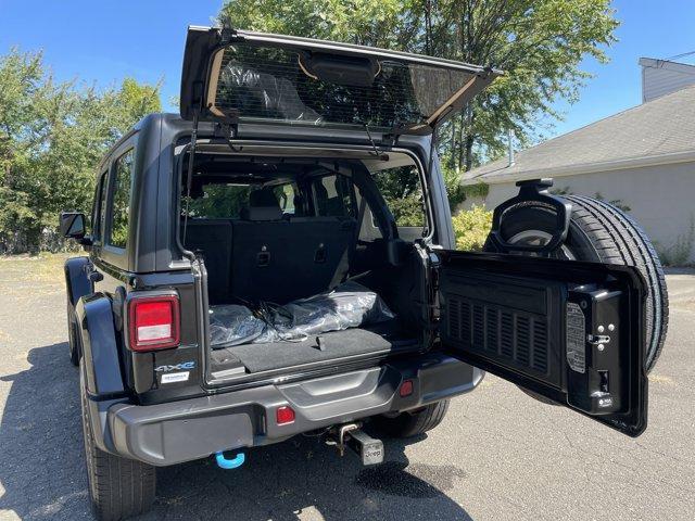 used 2024 Jeep Wrangler 4xe car, priced at $36,258