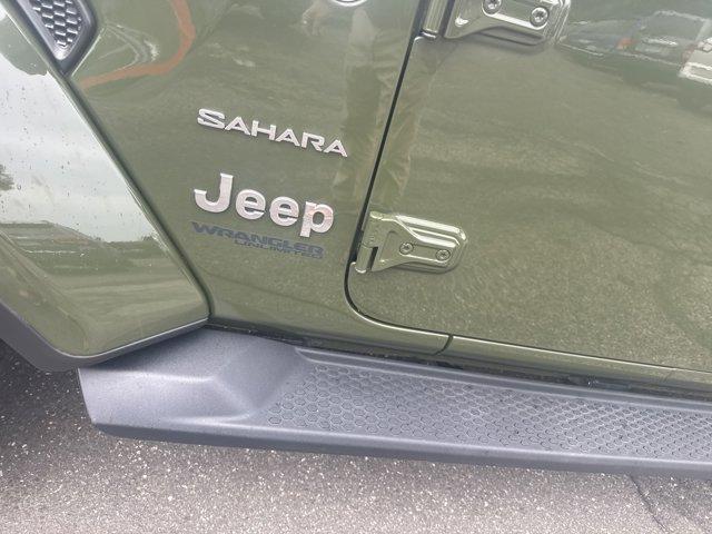 used 2021 Jeep Wrangler Unlimited car, priced at $31,052