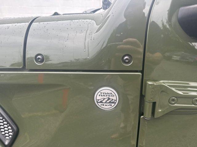 used 2021 Jeep Wrangler Unlimited car, priced at $31,052