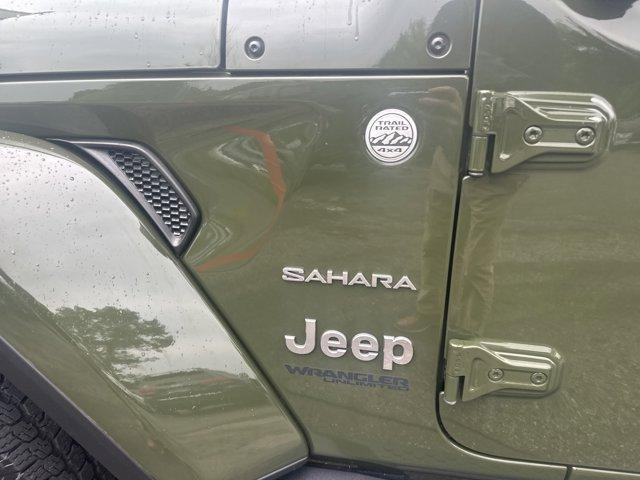 used 2021 Jeep Wrangler Unlimited car, priced at $31,052