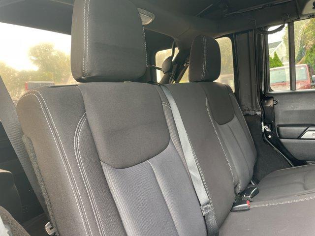 used 2013 Jeep Wrangler Unlimited car, priced at $16,664