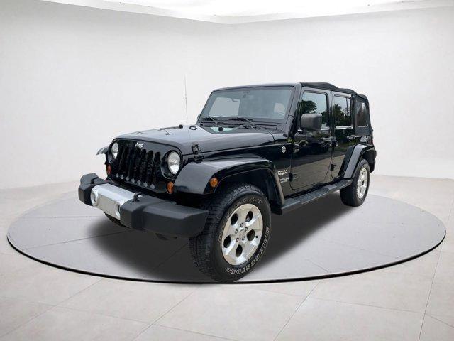 used 2013 Jeep Wrangler Unlimited car, priced at $16,664