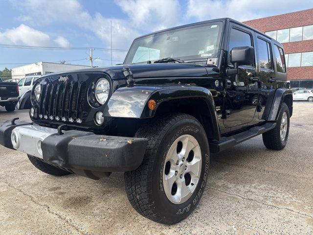 used 2015 Jeep Wrangler Unlimited car, priced at $15,591