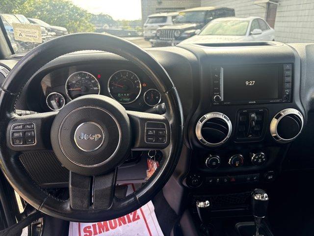 used 2015 Jeep Wrangler Unlimited car, priced at $15,591