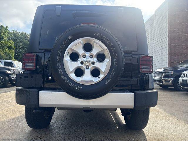 used 2015 Jeep Wrangler Unlimited car, priced at $15,591