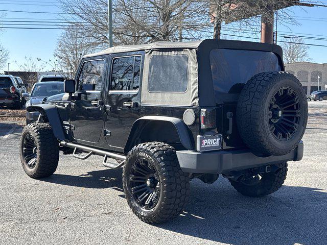 used 2015 Jeep Wrangler Unlimited car, priced at $21,997