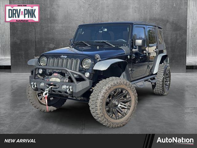 used 2015 Jeep Wrangler Unlimited car, priced at $21,997