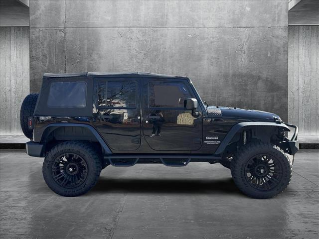 used 2015 Jeep Wrangler Unlimited car, priced at $21,997