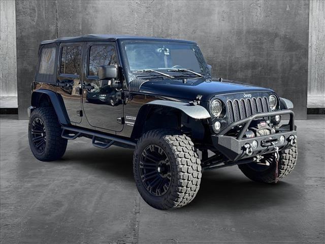 used 2015 Jeep Wrangler Unlimited car, priced at $21,997