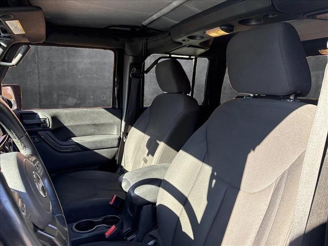 used 2015 Jeep Wrangler Unlimited car, priced at $21,997