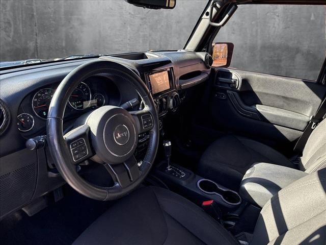 used 2015 Jeep Wrangler Unlimited car, priced at $21,997