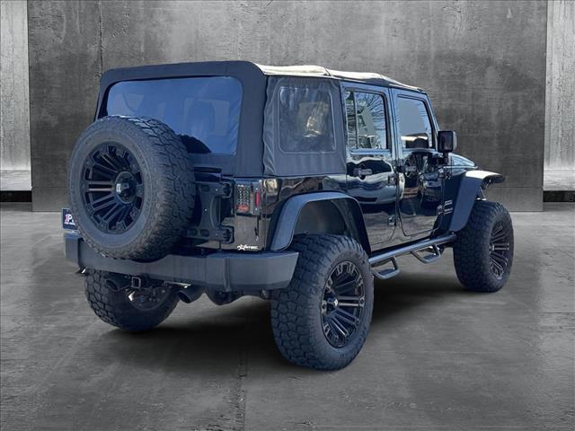 used 2015 Jeep Wrangler Unlimited car, priced at $21,997