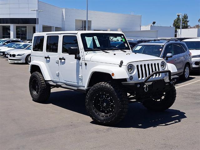 used 2015 Jeep Wrangler Unlimited car, priced at $18,451