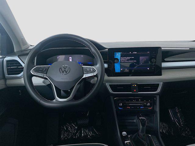 new 2025 Volkswagen Taos car, priced at $29,718