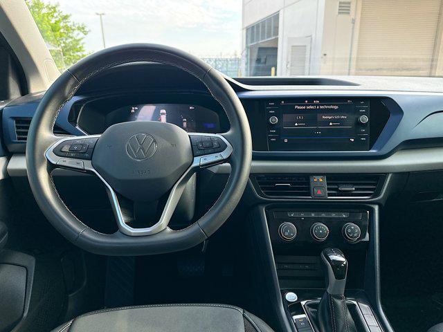 used 2023 Volkswagen Taos car, priced at $18,929