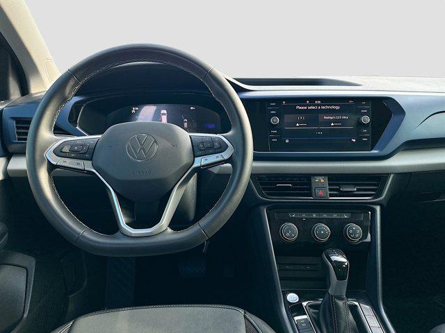used 2023 Volkswagen Taos car, priced at $18,929