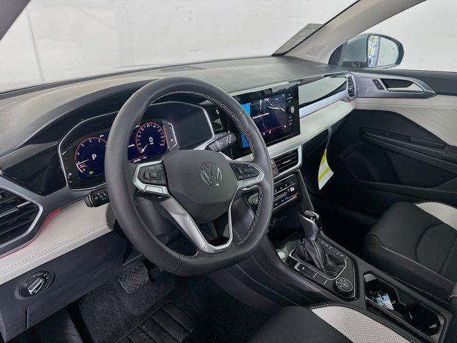 new 2025 Volkswagen Taos car, priced at $35,214