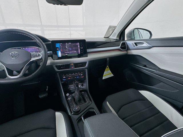 new 2025 Volkswagen Taos car, priced at $35,214