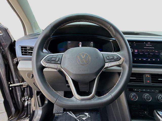 used 2022 Volkswagen Taos car, priced at $18,673