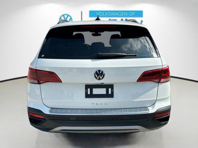 used 2023 Volkswagen Taos car, priced at $18,281