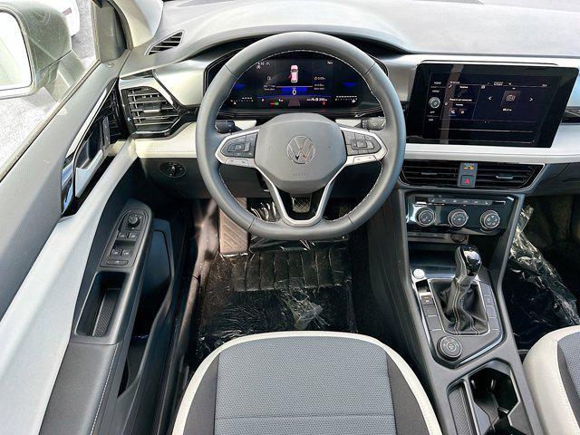 new 2025 Volkswagen Taos car, priced at $27,000