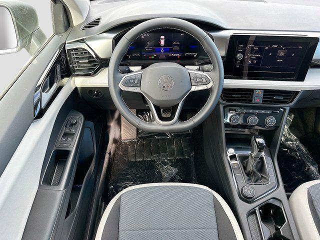 new 2025 Volkswagen Taos car, priced at $26,500