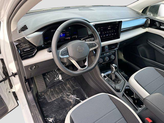 new 2025 Volkswagen Taos car, priced at $26,500