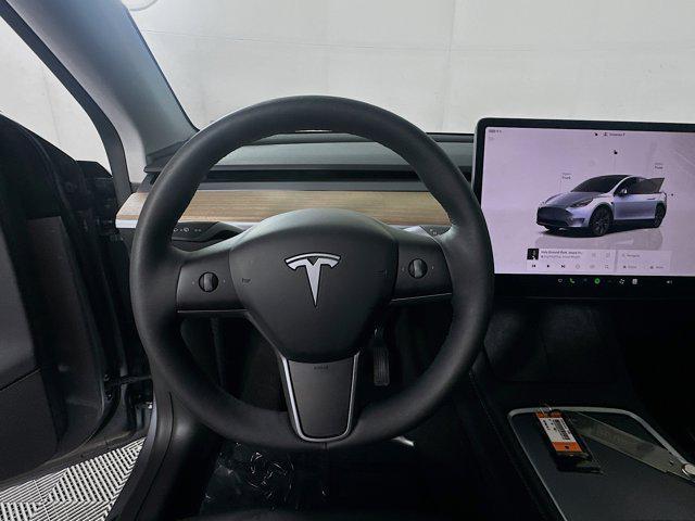 used 2025 Tesla Model Y car, priced at $36,105