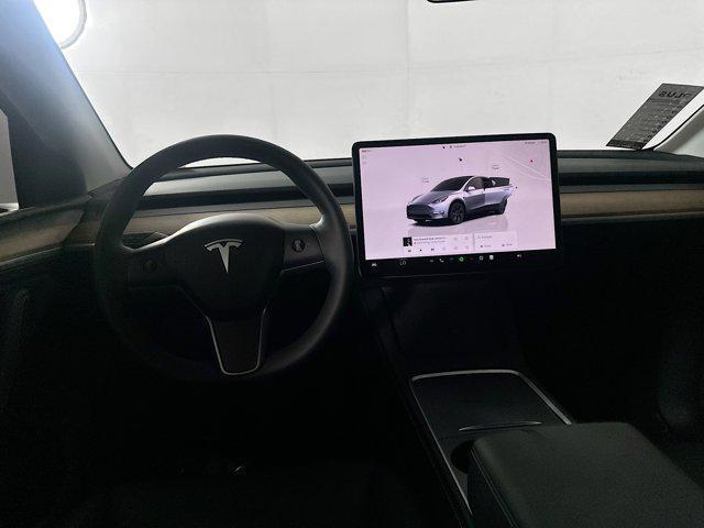 used 2025 Tesla Model Y car, priced at $36,105