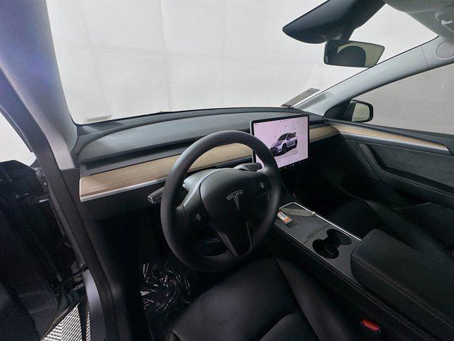 used 2025 Tesla Model Y car, priced at $36,105