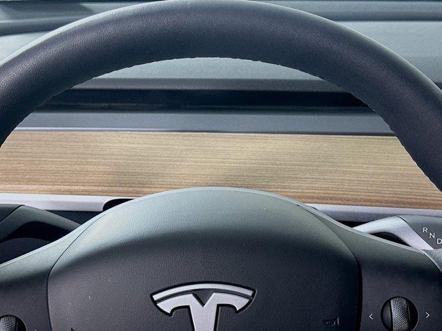 used 2025 Tesla Model Y car, priced at $36,105