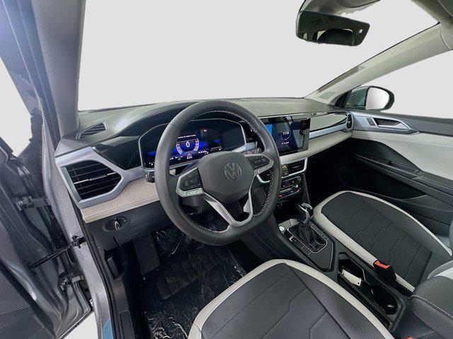 new 2025 Volkswagen Taos car, priced at $26,718
