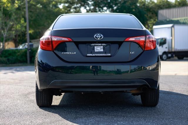 used 2018 Toyota Corolla car, priced at $9,999