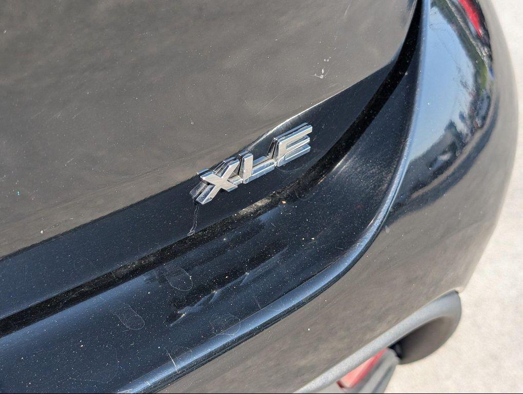 used 2024 Toyota Highlander car, priced at $32,900