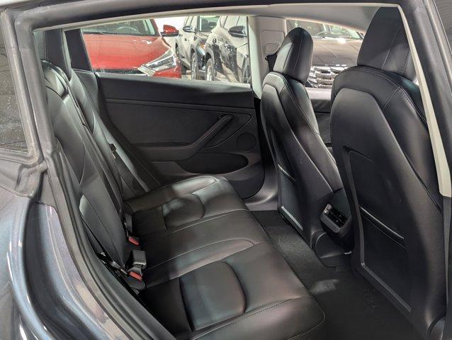 used 2023 Tesla Model 3 car, priced at $27,551