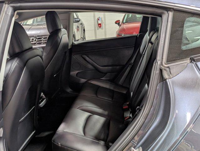 used 2023 Tesla Model 3 car, priced at $27,551