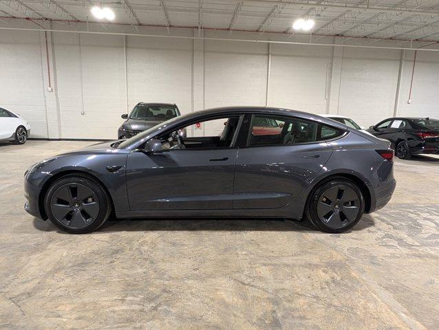 used 2023 Tesla Model 3 car, priced at $27,551