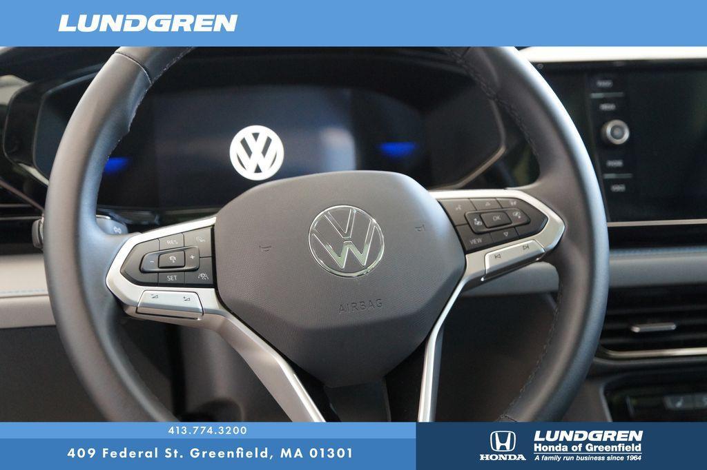 used 2024 Volkswagen Taos car, priced at $28,082