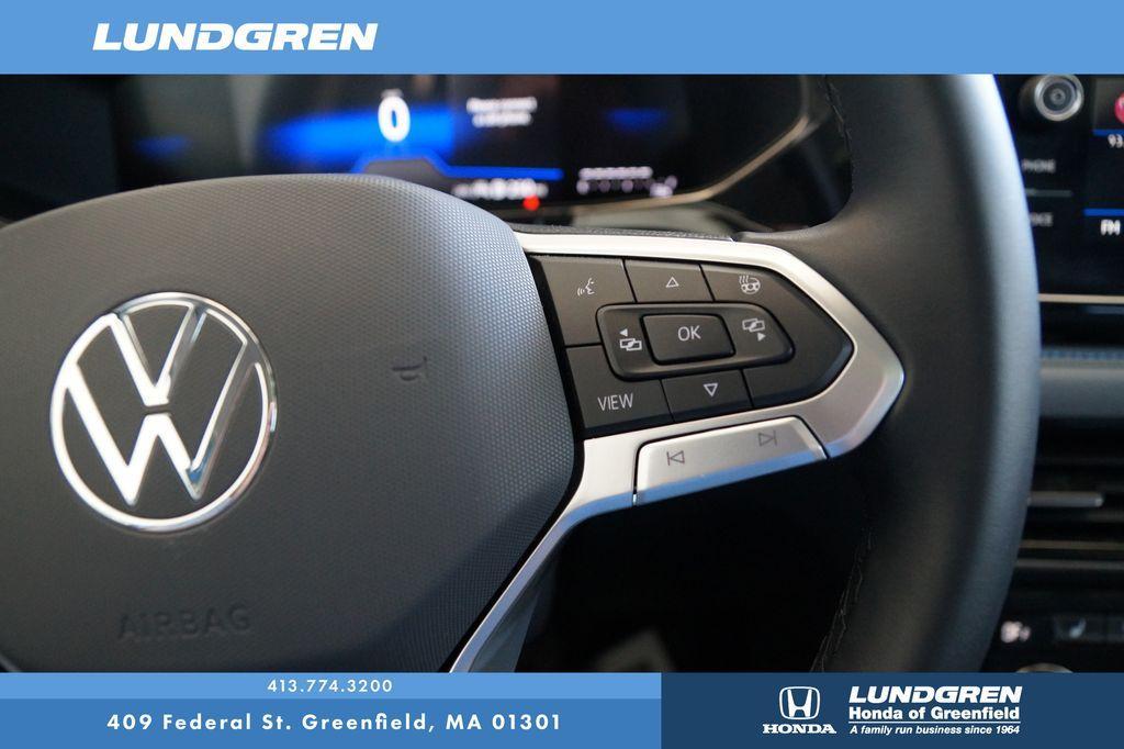 used 2024 Volkswagen Taos car, priced at $28,082