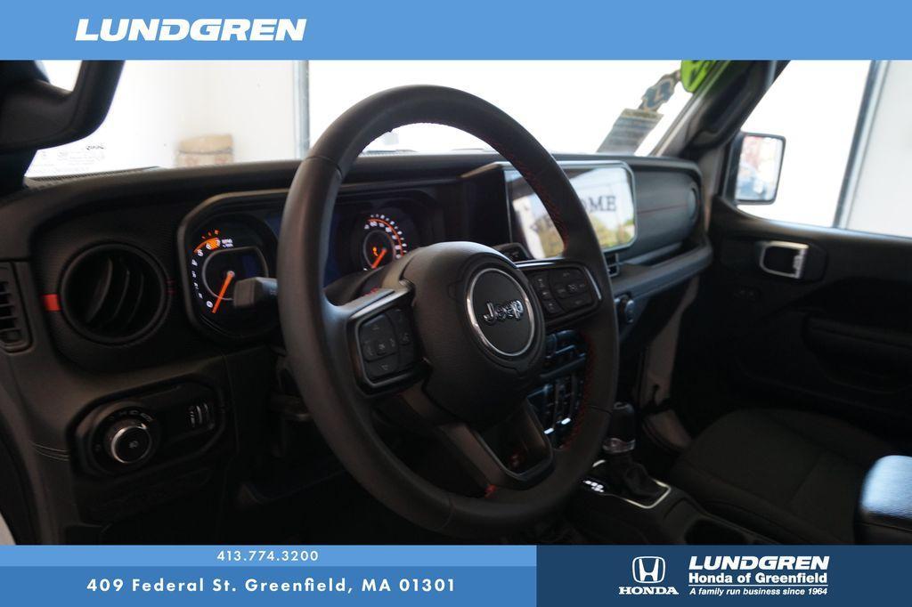 used 2024 Jeep Wrangler car, priced at $48,946