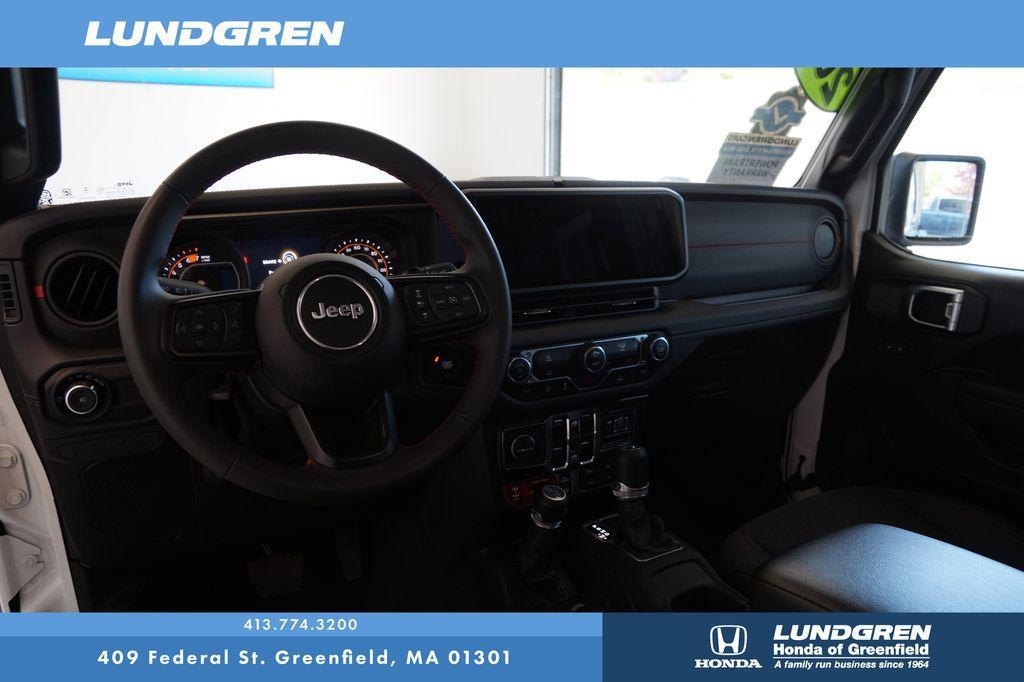 used 2024 Jeep Wrangler car, priced at $48,946