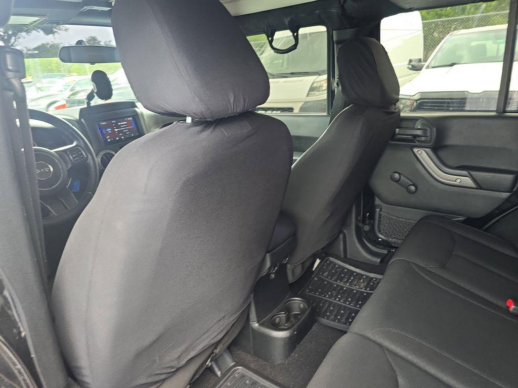 used 2015 Jeep Wrangler Unlimited car, priced at $13,490