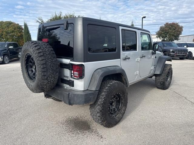used 2011 Jeep Wrangler Unlimited car, priced at $15,346