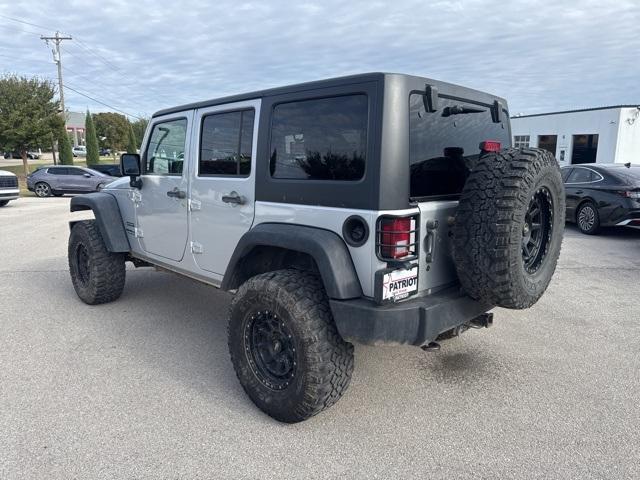 used 2011 Jeep Wrangler Unlimited car, priced at $15,346
