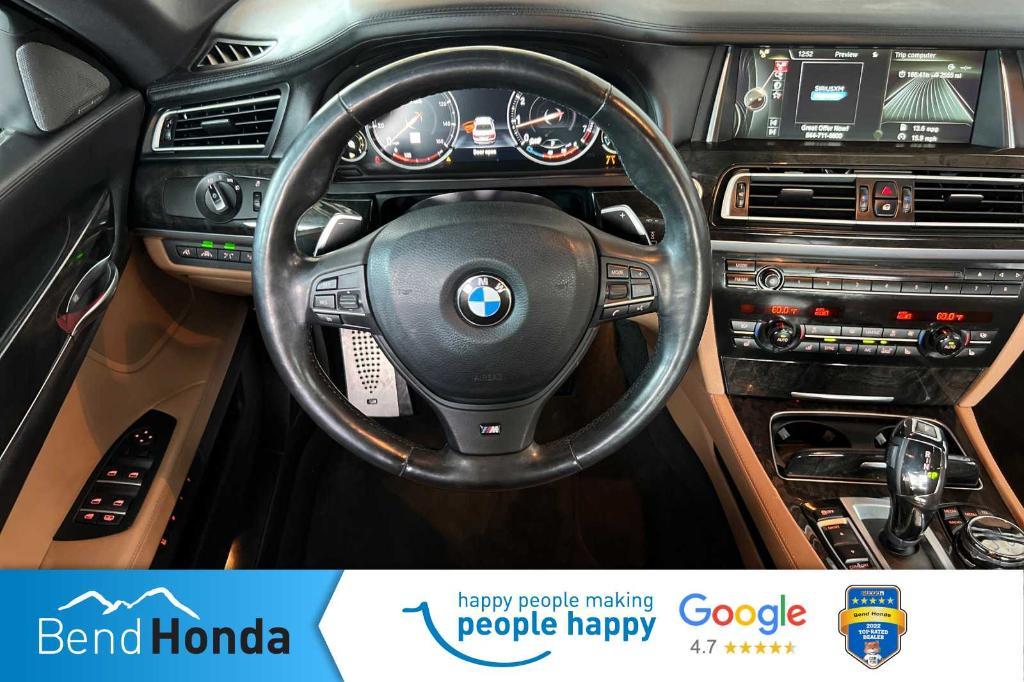 used 2014 BMW 750 car, priced at $13,990